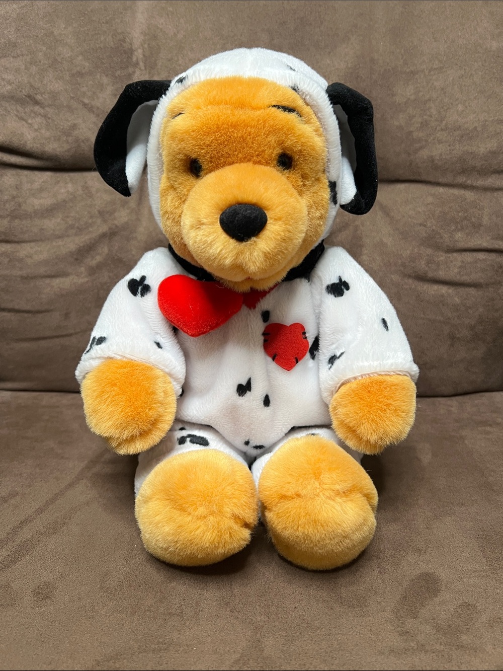 Plush Yellow Bear in White Dalmatian-Style Outfit with Red Heart Accent